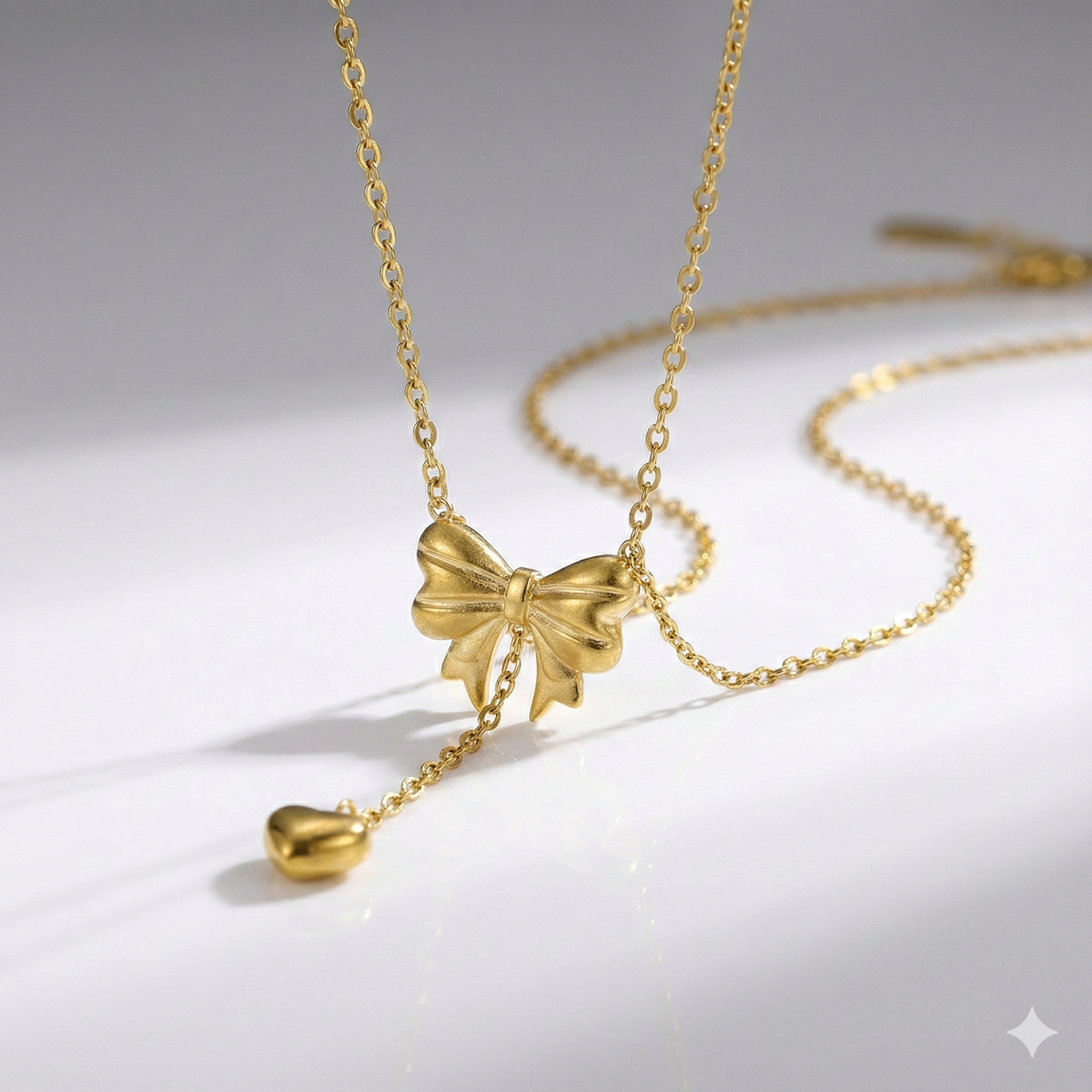 Gold Plated Stainless Steel Anti Tarnish Heart Themed Bow inspired Pendant Necklace